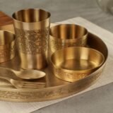 brass thali set with spoon katori glass and sweet dish bowl
