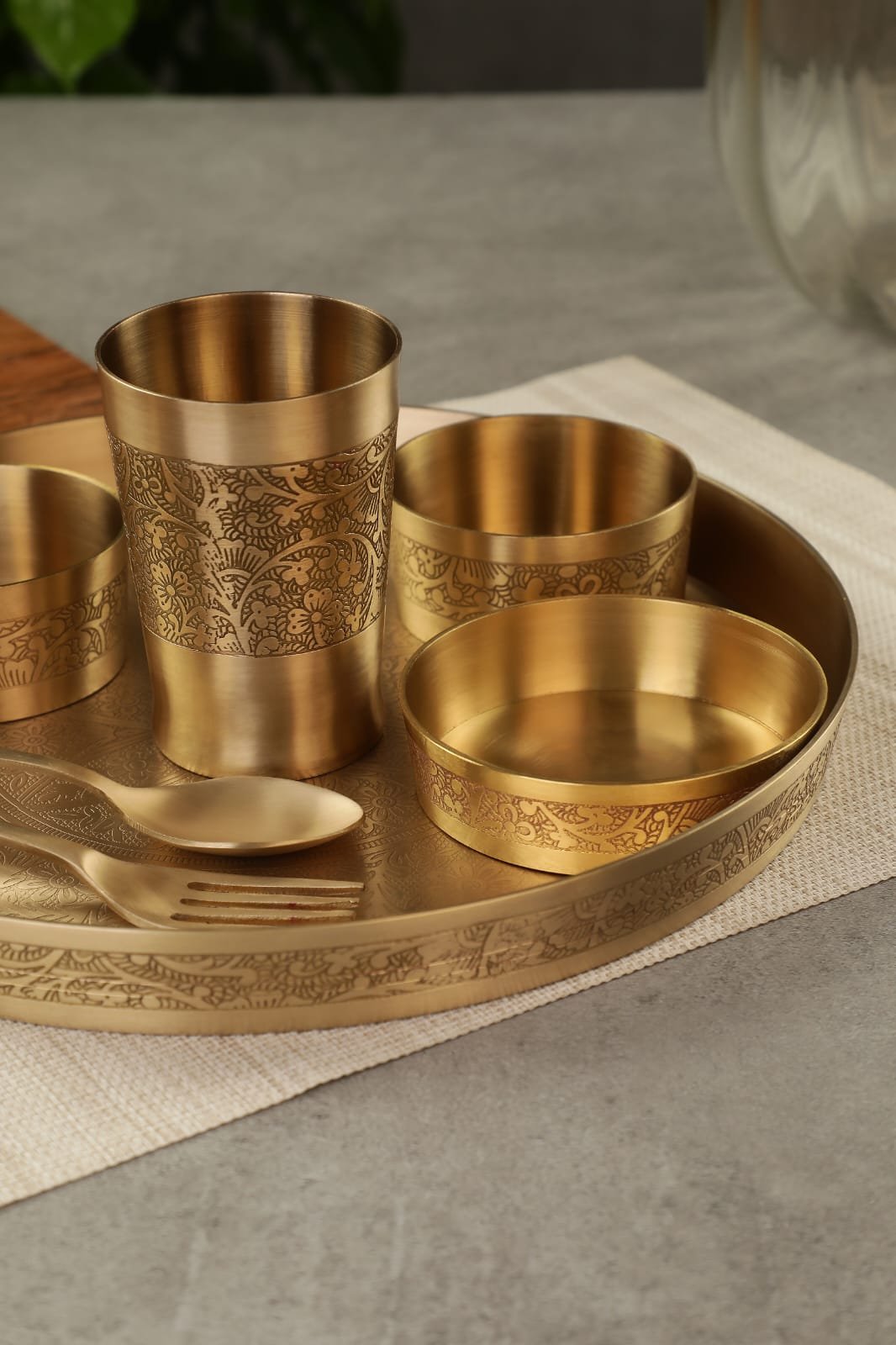 brass thali set with spoon katori glass and sweet dish bowl