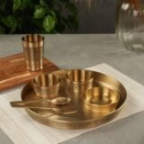 brass thali set with spoon katori glass and sweet dish bowl